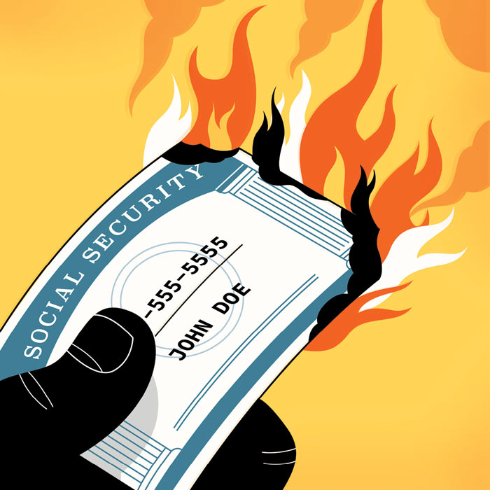 illustration of a hand holding a burning social security card
