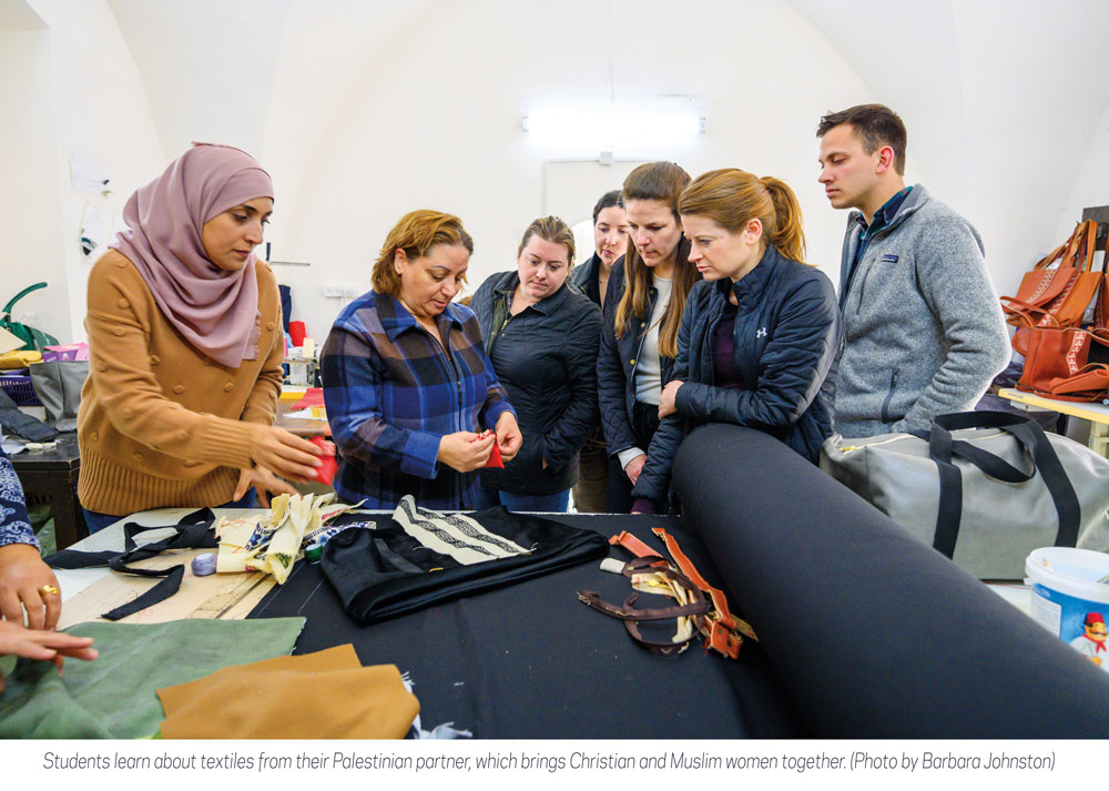 students learn about textiles from their Palestinian partner