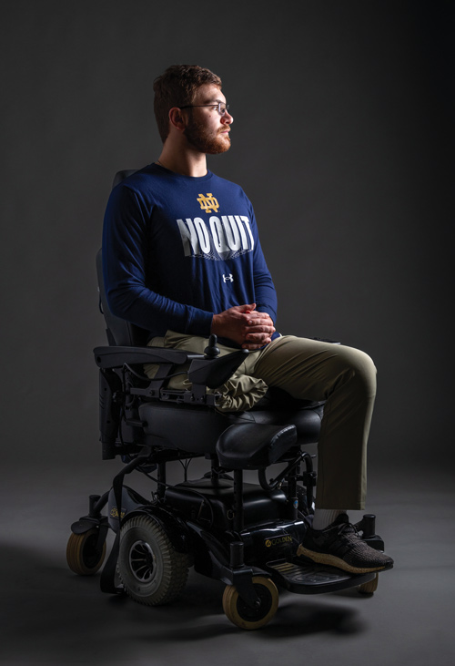 Andrew Daigneau in a wheelchair