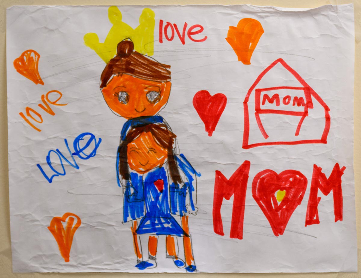 (A drawing by her children that says love mom)